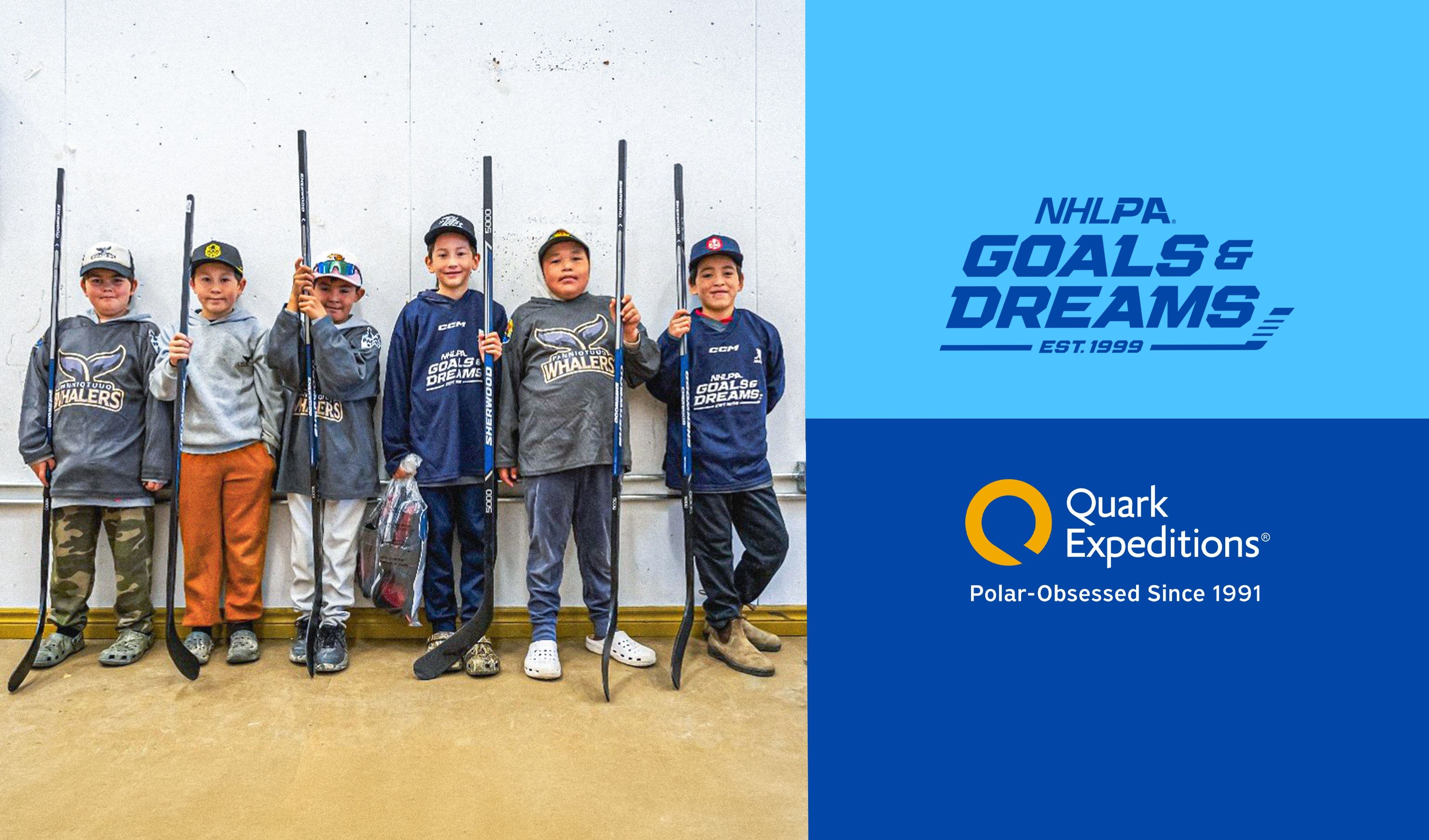 Six young boys holding hockey sticks, with NHLPA Goals & Dreams and Quark Expeditions logos.
